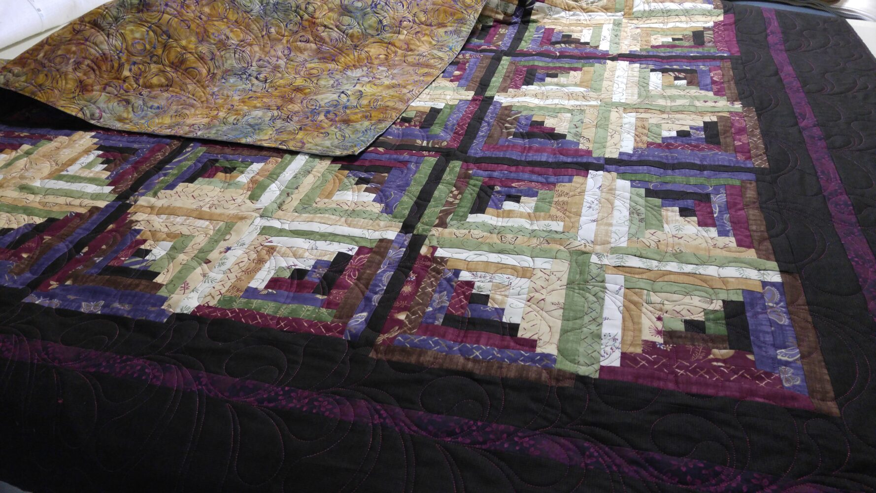 Cornerstone Quilting Computerized and hand guided quilting