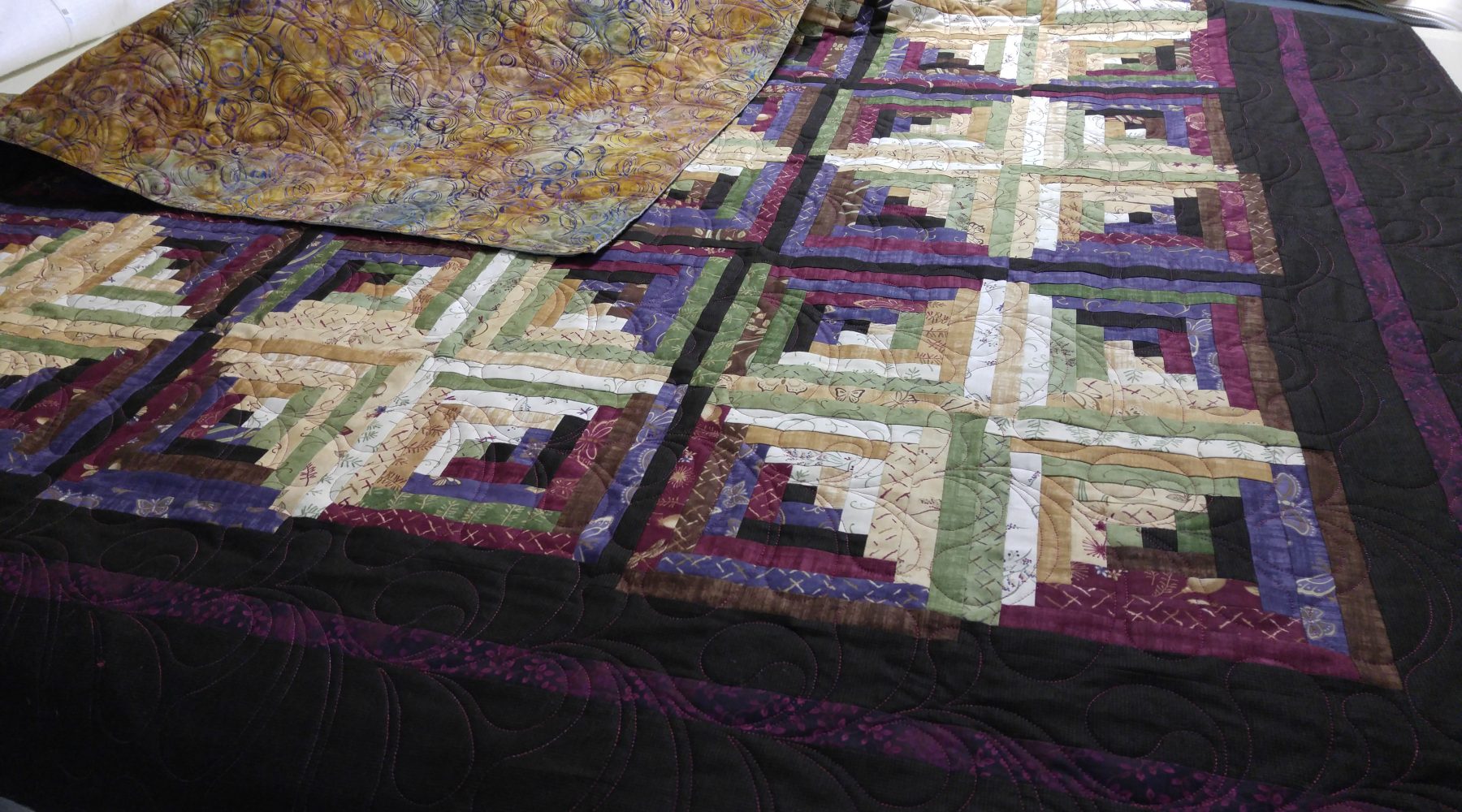 Cornerstone Quilting Computerized and hand guided quilting