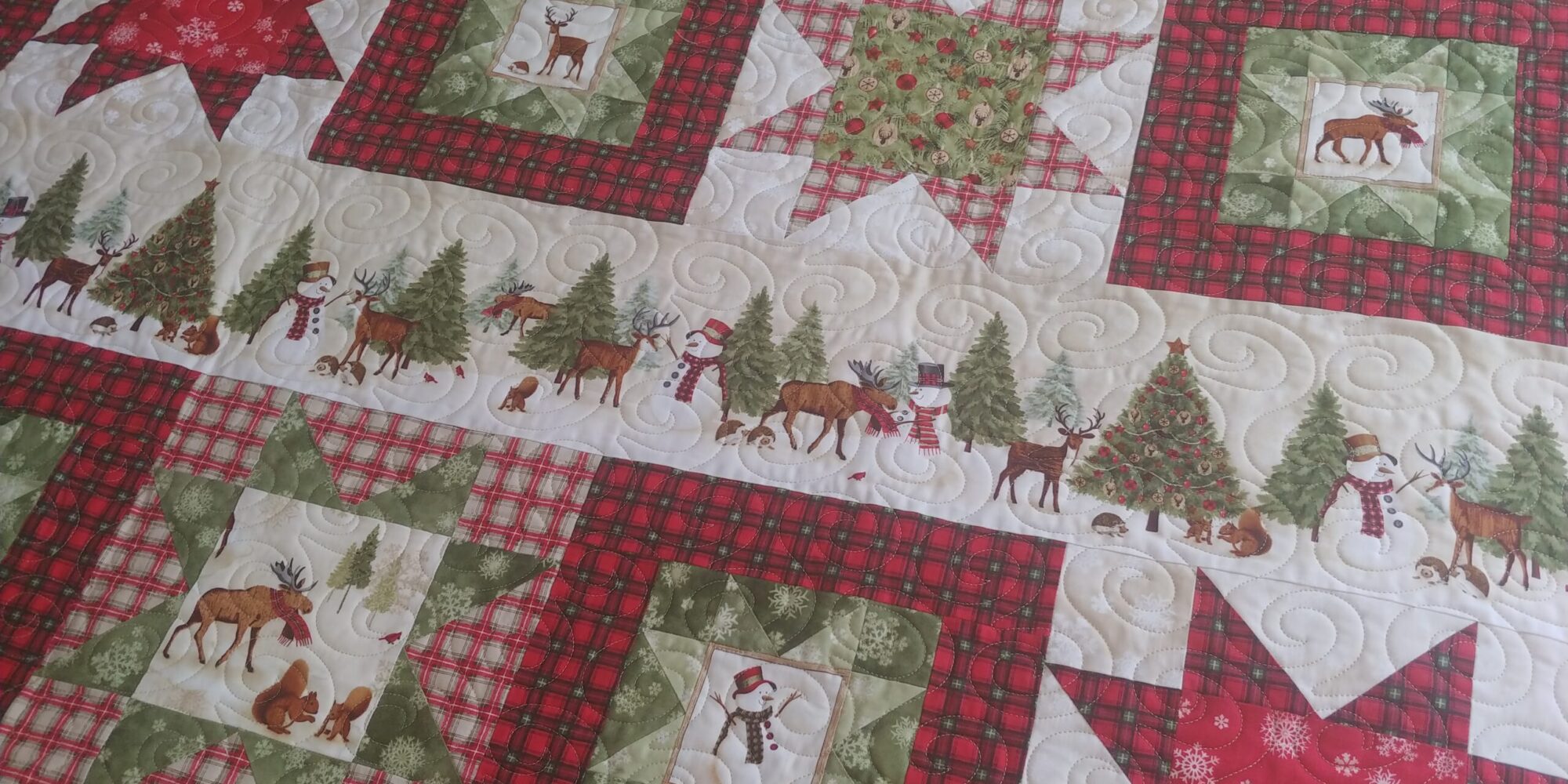 Cornerstone Quilting Computerized and hand guided quilting